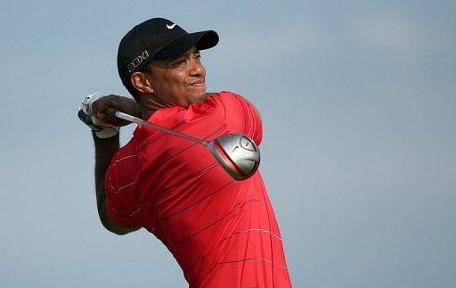 Tiger Woods, pictured, is in first place while Rory McIlroy is currently third